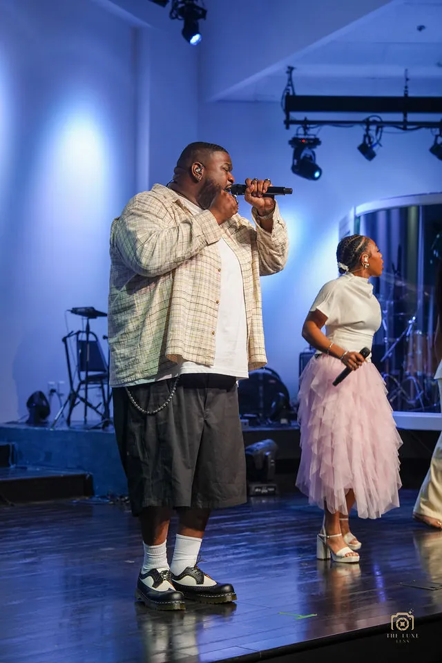 Live vocalist performing at a Houston event